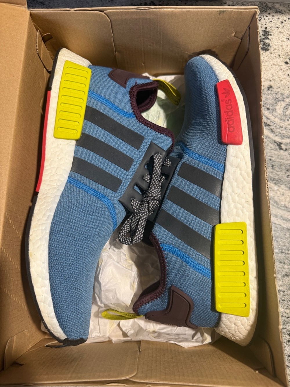 adidas NMD R1 “Villa” Blue Knit Sneakers with Yellow & Red Accents
